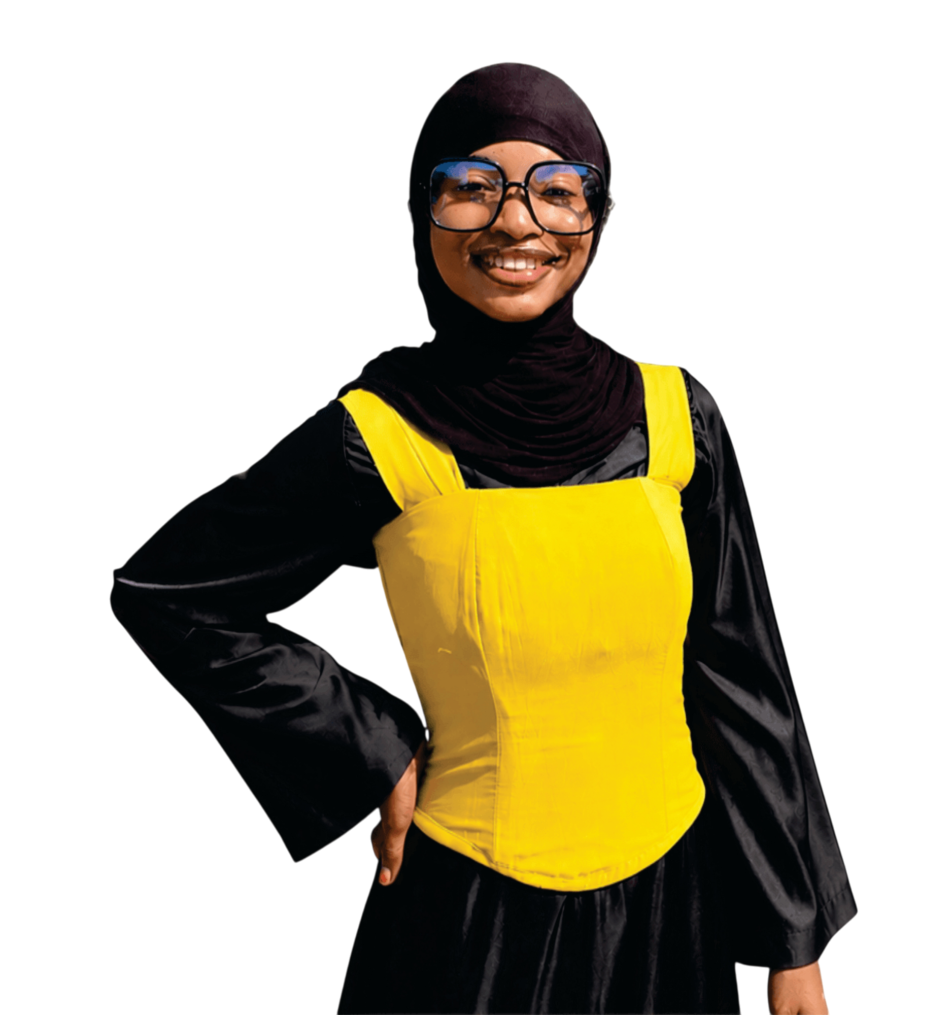Heesha wearing yellow and black, smiling